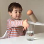 Give the edge of the plate a firm hit