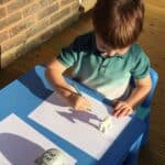 Place the figure to block the light and create a shadow